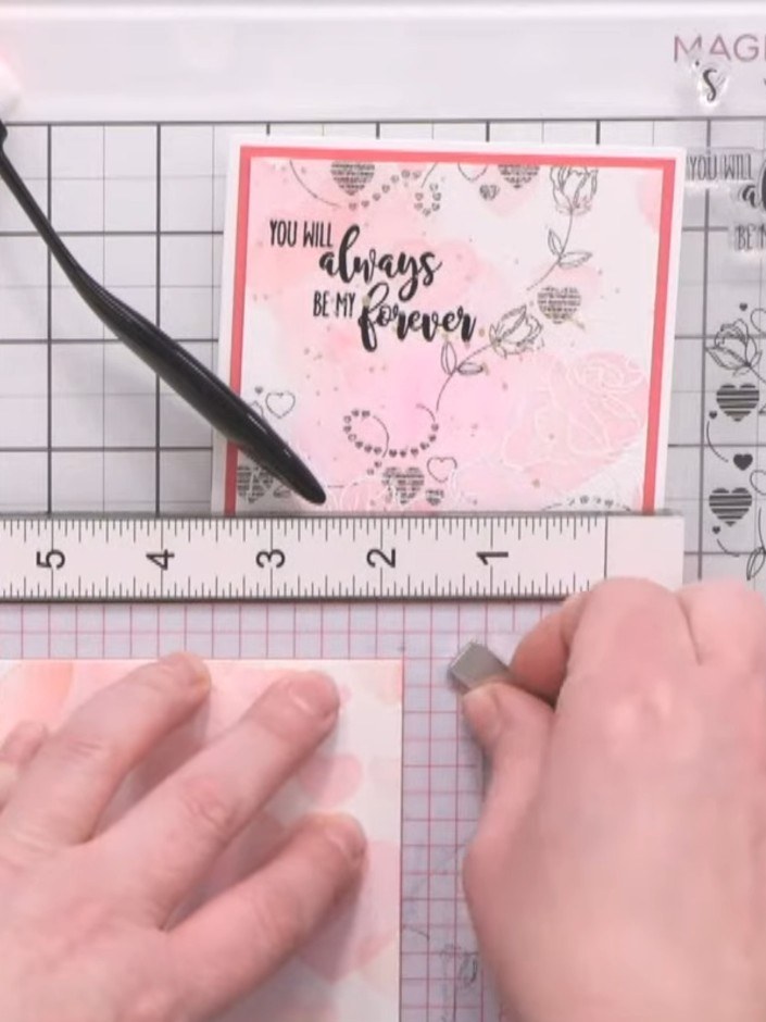 Step 4: Stamp the cascading hearts and roses design from the Uniko Falling For You Valentine Bundle onto the pink wate