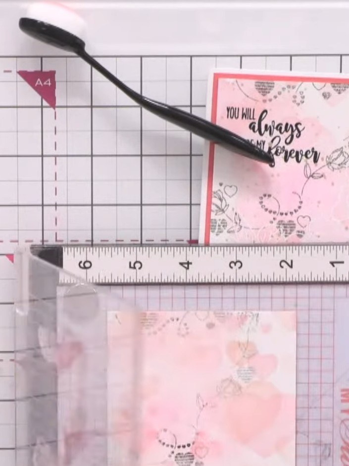 Step 5: Re-ink the stamp lightly and press onto the card to create softer, second-generation impressions. Fill in area
