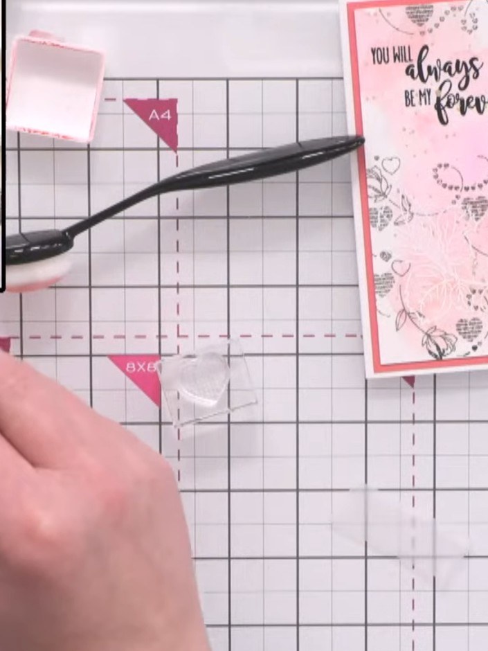 Step 9: Mount your finished artwork onto a card base using foam adhesive for dimension. Position the decorated panel c