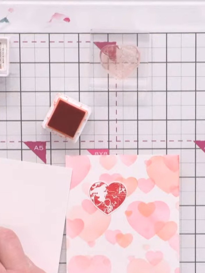 Step 1: Stamp the textured heart from the Big & Bold Love stamp set onto white cardstock using a coordinating ink colo