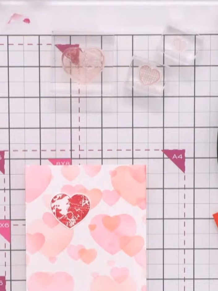 Step 2: Carefully fussy cut around the stamped heart shape using small scissors or a craft knife. Take your time to cu