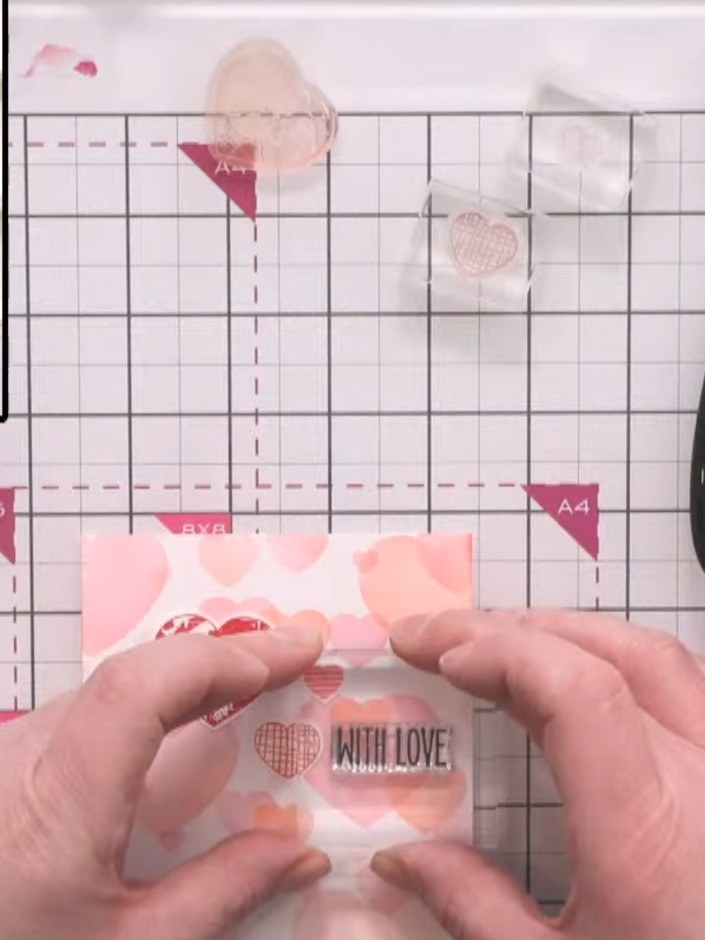 Step 3: Stamp a sentiment such as 'With Love' onto your card base using the thin-lined sentiment stamps from the Big &