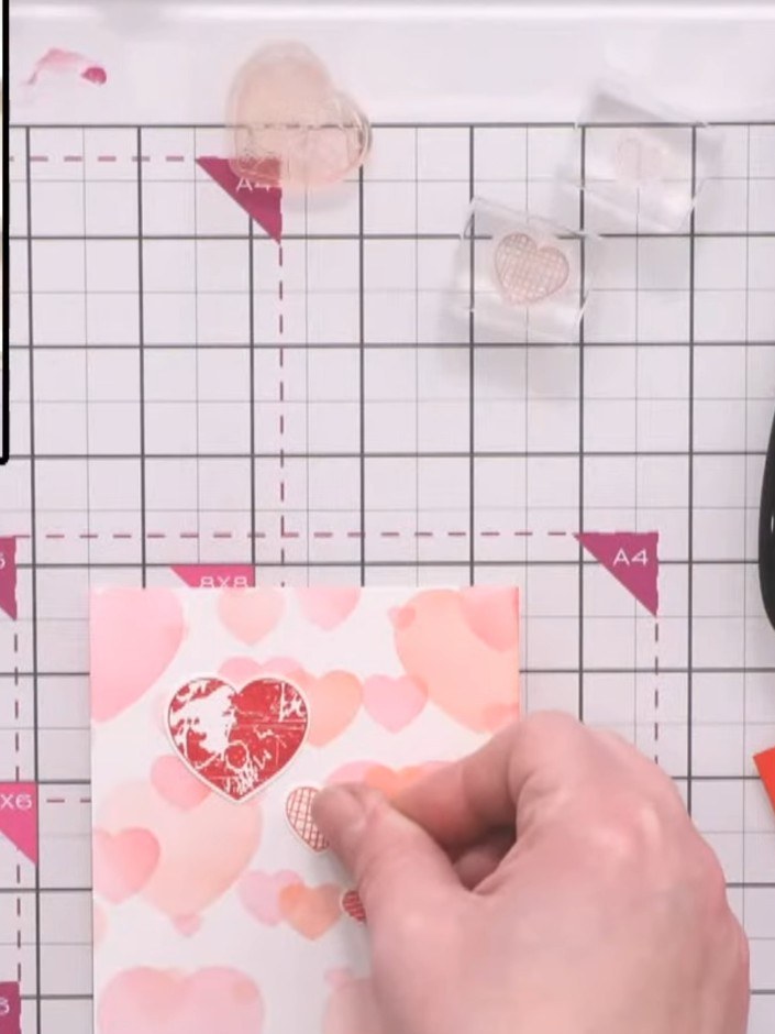Step 4: Apply foam adhesive to the back of your fussy-cut heart. Layer the heart over the sentiment on your card front