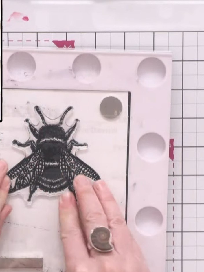 Step 1: Stamp the large bee from the Queen Bee A5 stamp set onto white cardstock using hybrid black ink. Press firmly 