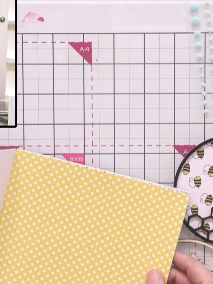Step 1: Cut a 15 cm square card base from white cardstock and fold it in half to create a gatefold format. Score and f