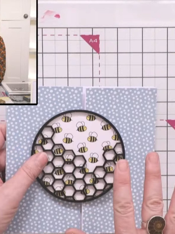 Step 3: Use the hex matrix stencil to apply yellow ink to the inside left panel of the card, creating a hexagon patter