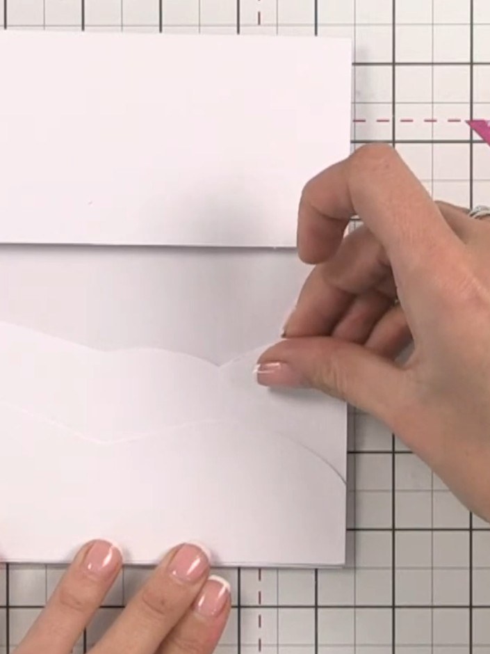 Step 6: Glue the hill shapes to the inside of the card base. Adhere only at the base of each hill piece to allow the b
