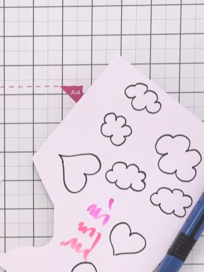 Step 5: Colour the heart balloon using watercolour pens. Start with the lightest pink colour all over, then layer dark