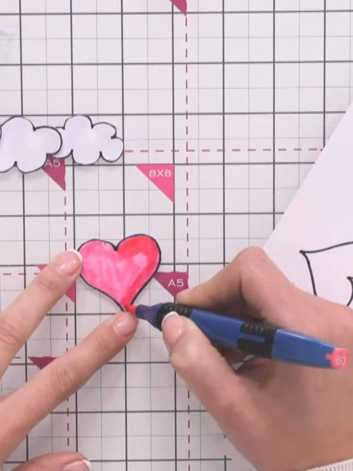 Step 6: Blend the watercolour pen colours by adding a touch of water with a brush or water pen to create a watercolour