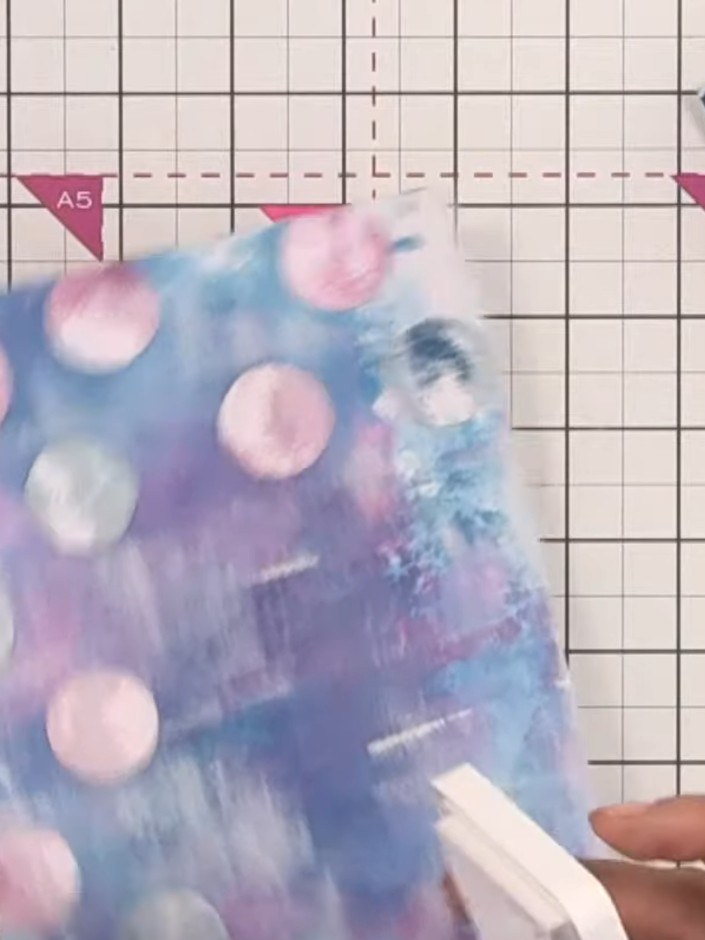 Step 10: Using black ink, carefully edge around all four sides of the watercolour background piece to create definition