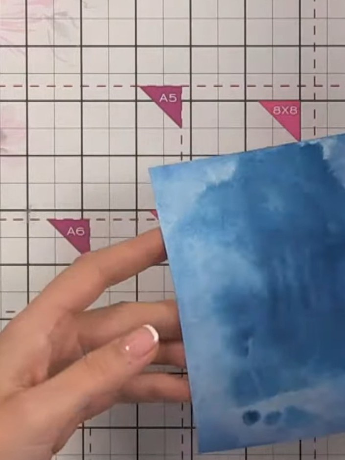 Step 4: Apply Fandango ink to your craft mat and pick it up with the watercolour paper, blending it into the existing 