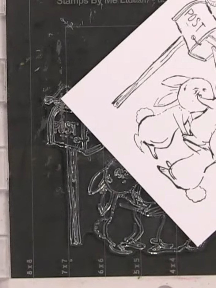 Step 8: Carefully fussy-cut around the stamped bunny images, separating each bunny so you can position them individual