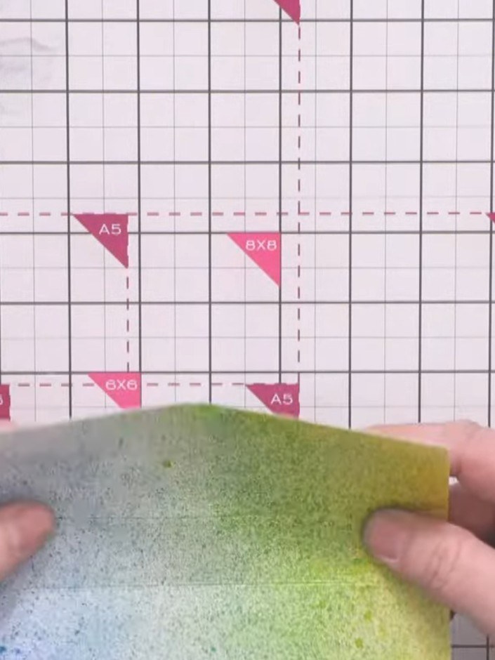 Step 5: Crease all score lines in both directions using a bone folder. Fold the card back and forth along each scored 