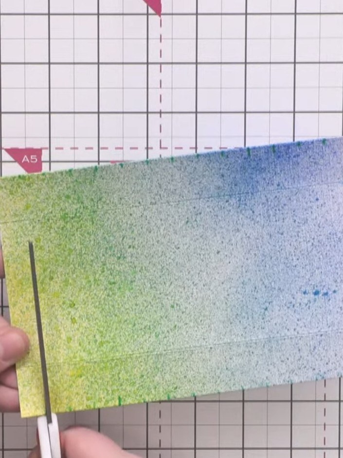 Step 8: Cut vertical slits down to the first score line at each half-inch mark using scissors. Make sure the slits are