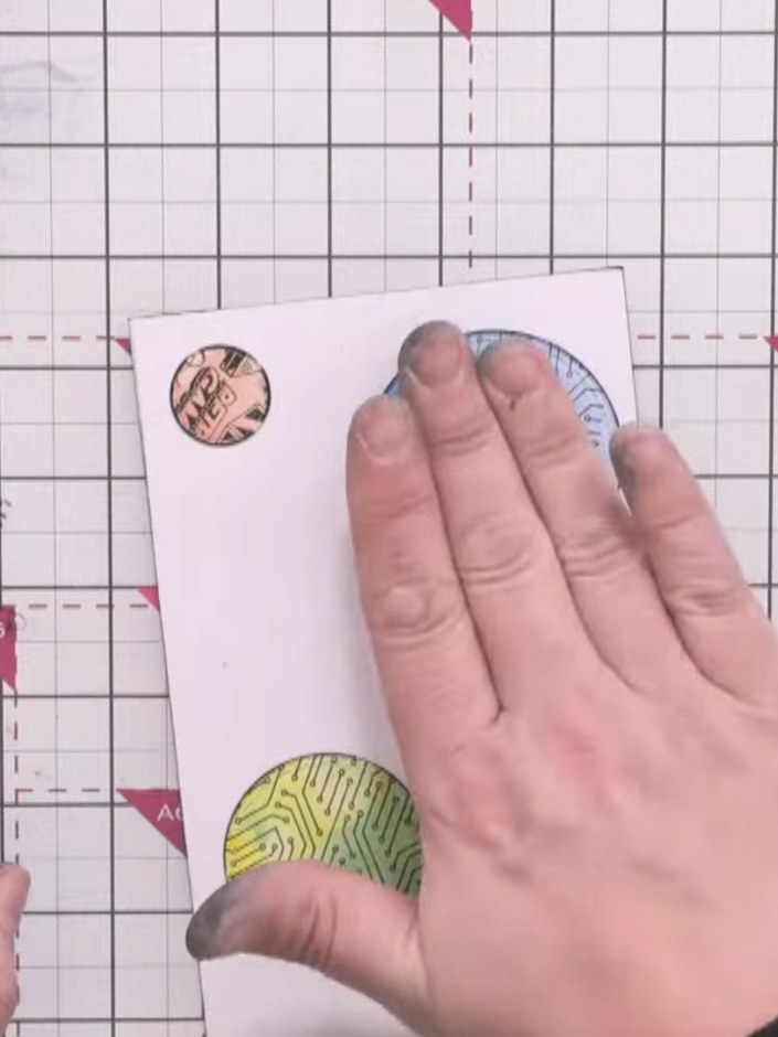 Step 10: Adhere the white card frame to the coloured background using foam pads for dimension. Position it carefully to