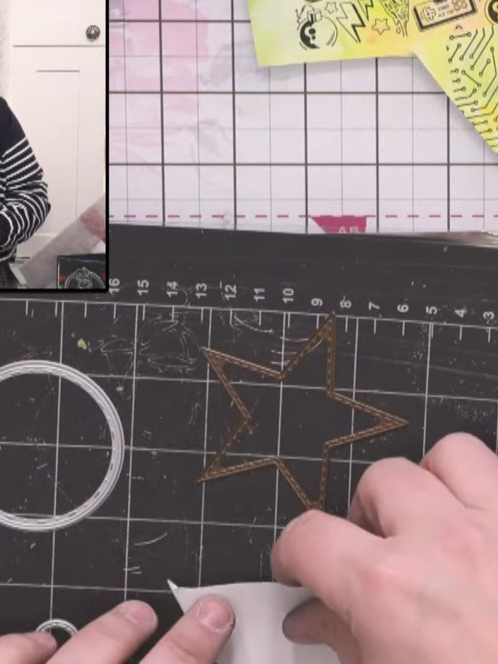 Step 5: Die-cut circles and stars from the stamped and coloured card scraps using a die-cutting machine with cutting p