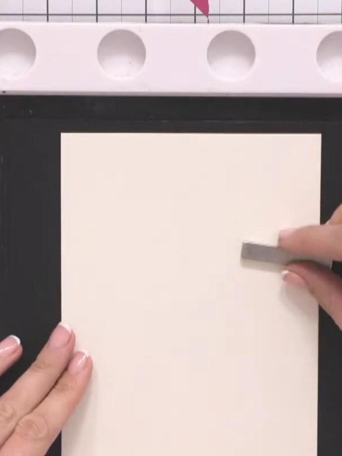 Step 1: Place your bunny stamp in the corner of the cream watercolour card. Position it so the bunnies sit within the 