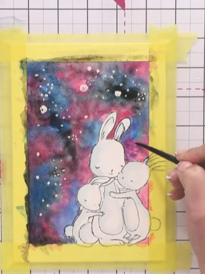 Step 11: Allow the watercolour background to dry completely before proceeding to the next step.