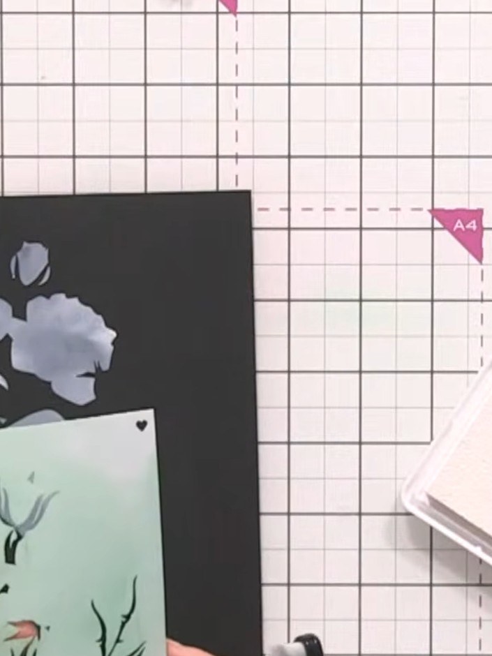 Step 5: Position stencil number three over your card and ink through with white ink using a blending tool. Ensure all 