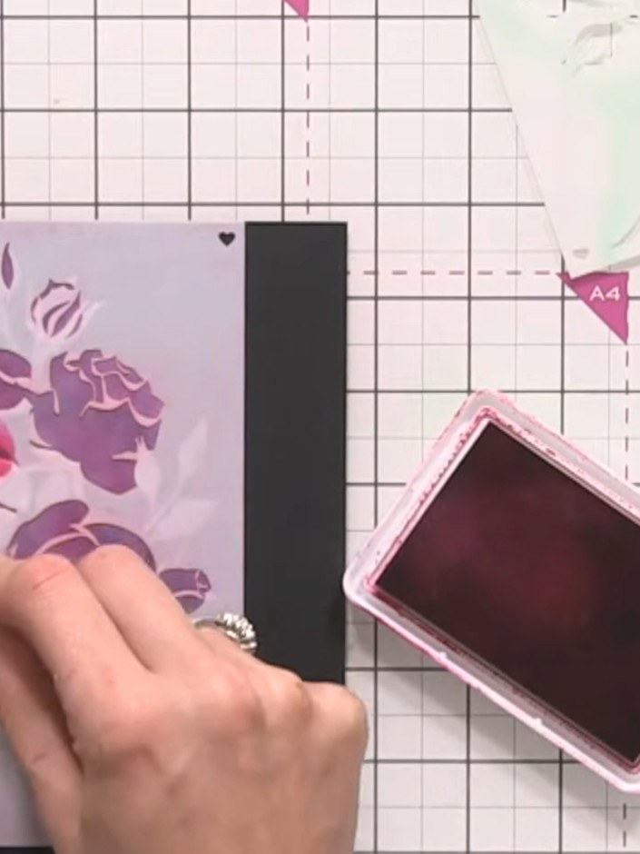Step 9: Apply the second stencil layer and ink through with pink ink using a blending tool, pressing slightly harder t