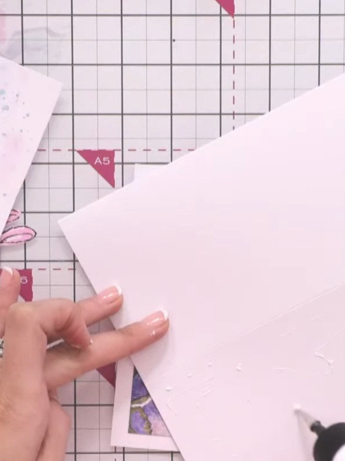 Step 16: Apply glue to the bottom section only of your easel card base. This will secure the card in its easel position