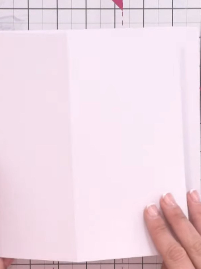 Step 2: Cut a second piece of white card to the same size as your card base. This will be adhered to the scored card t