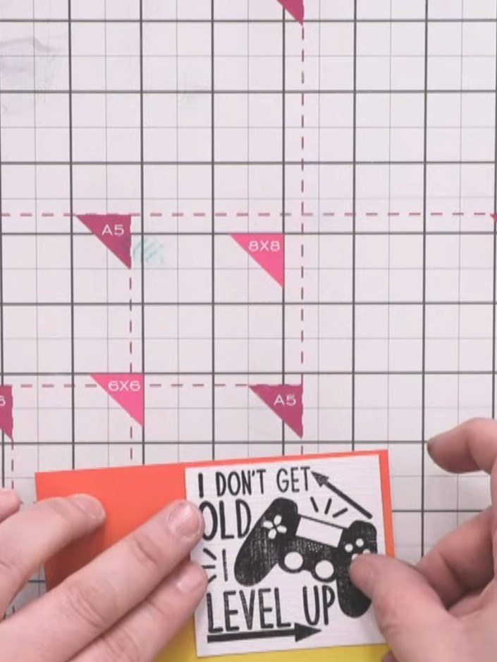 Step 10: Trim the sentiment panel to size. Lightly brush the green ink pad over the black stamped image to tone it down