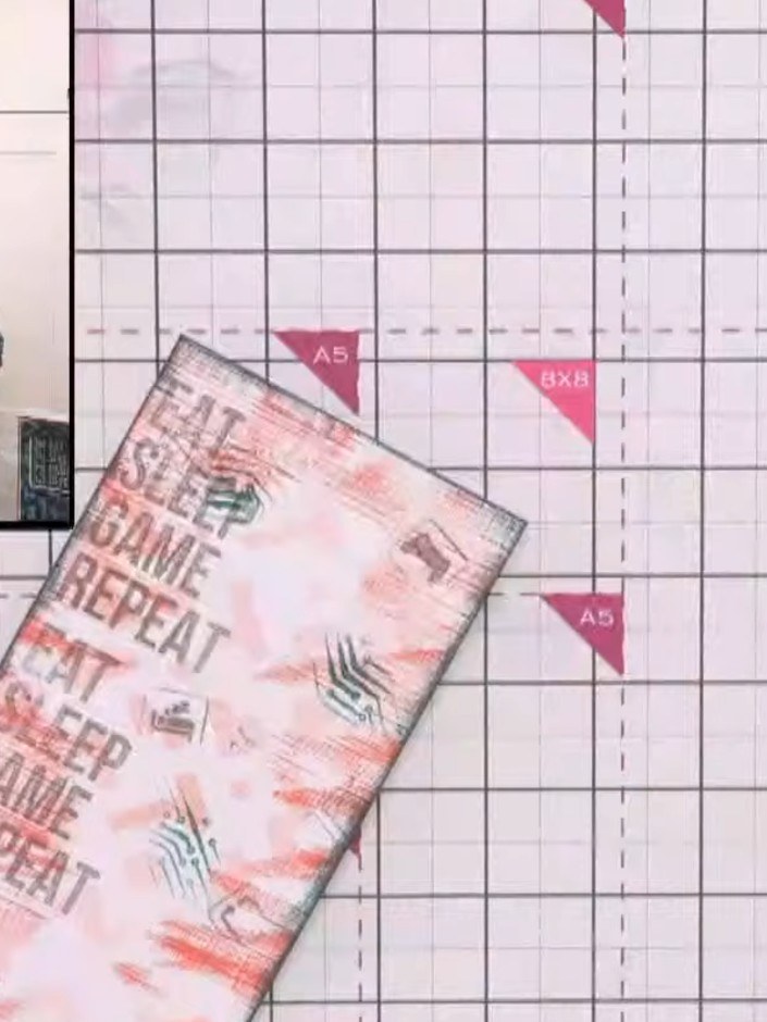 Step 7: Dab your finger onto the grey ink pad and press the Game Over background stamp onto it. Press the stamp down i