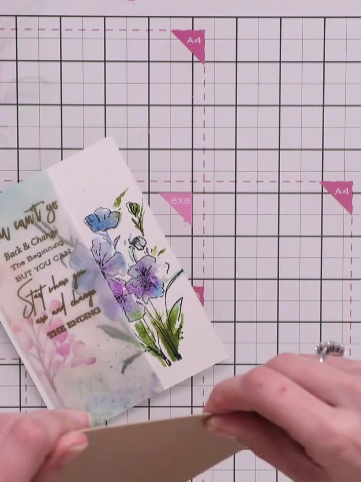 Step 10: Mount the combined vellum and watercolour panel onto black cardstock, creating a slim black border down the si