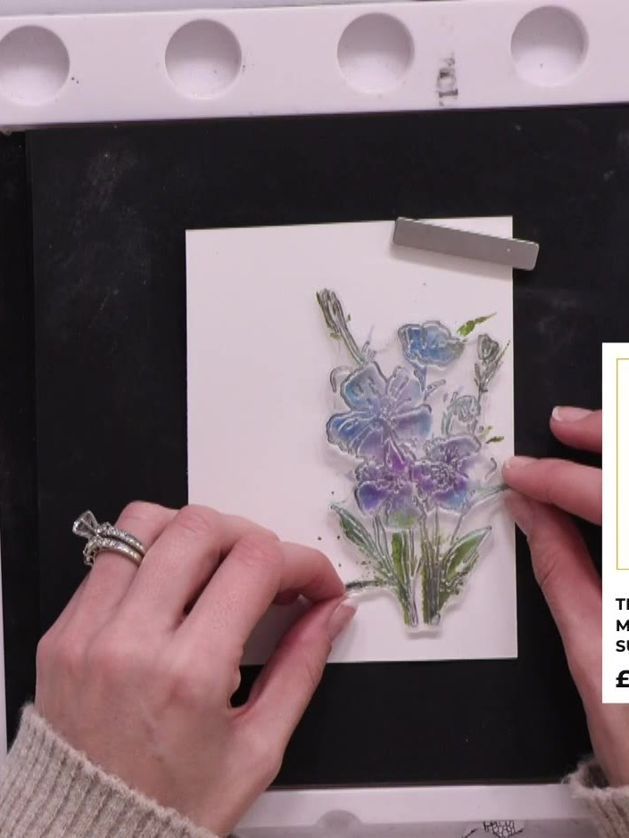 Step 6: Stamp the detail layer from the Eureka 101 stamp set on top of the dried watercolour floral image. Allow the s