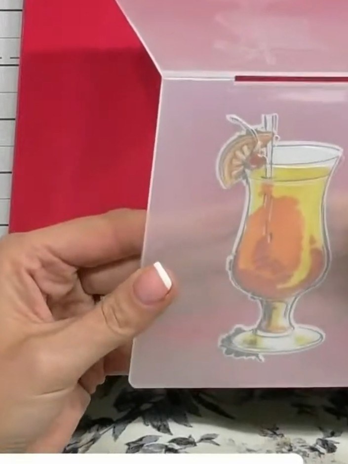 Step 9: Place the die-cut cocktail image into the 3D embossing folder, lining it up carefully with the embossed detail
