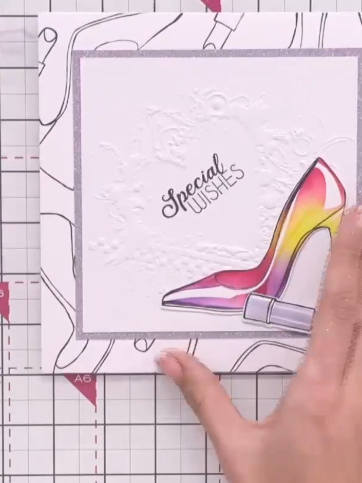 Step 11: Carefully remove the embossed component from the card front to reveal the 3D elevated effect created in the ce