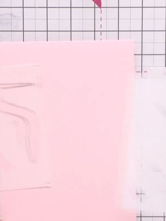 Step 2: Using your stencil, pop ink through the four heart registration marks in each corner onto your pink card base.