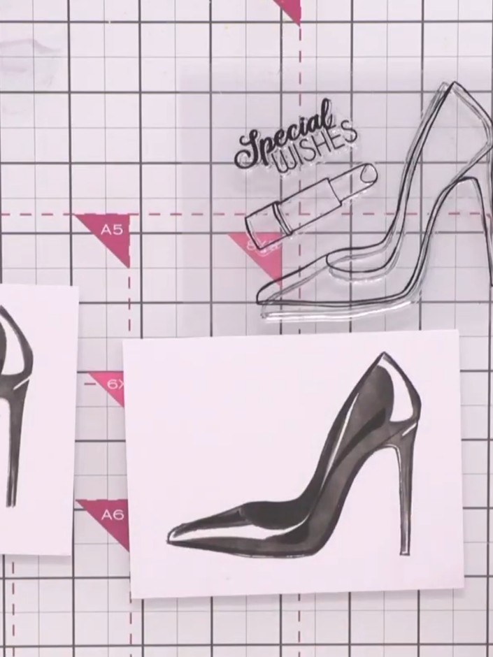Step 6: Stamp the coordinating shoe design from the Stamps By Me set onto your layered stencil work using the clear st