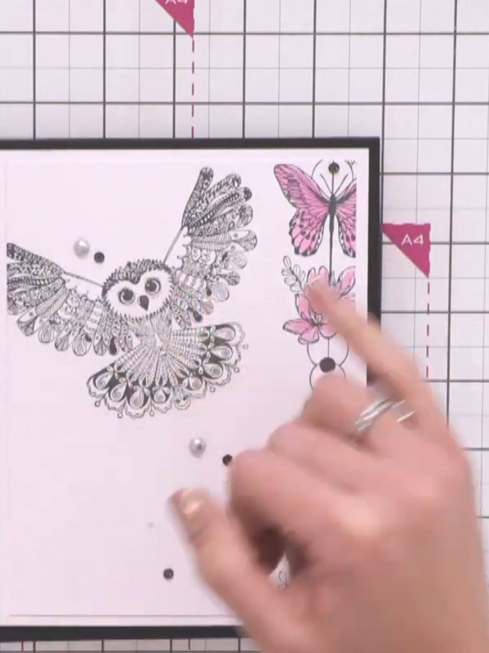 Step 1: Stamp the butterfly chain design down the right side of your white card panel, creating a vertical border. Add