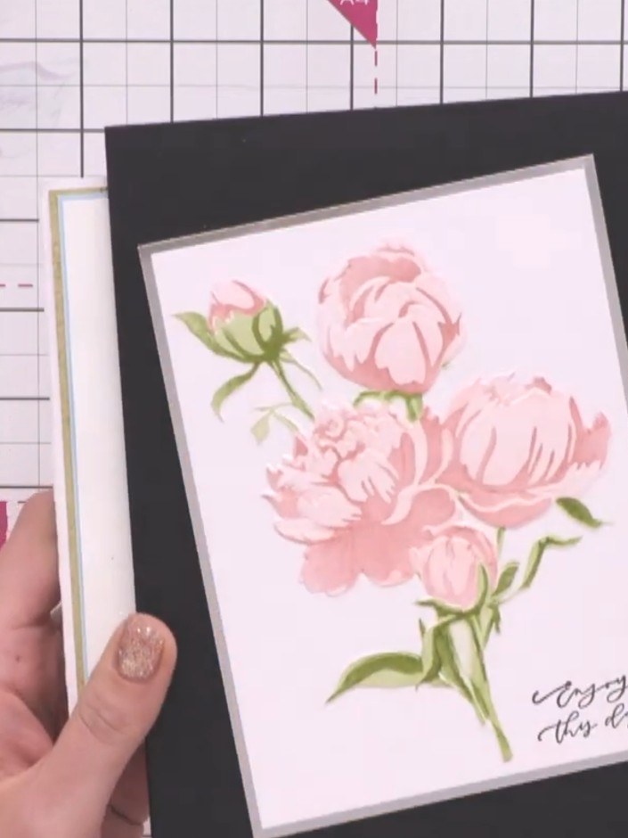 Step 5: Tilt the card forward so that only the embossed elements of the design are visible, creating a raised effect o