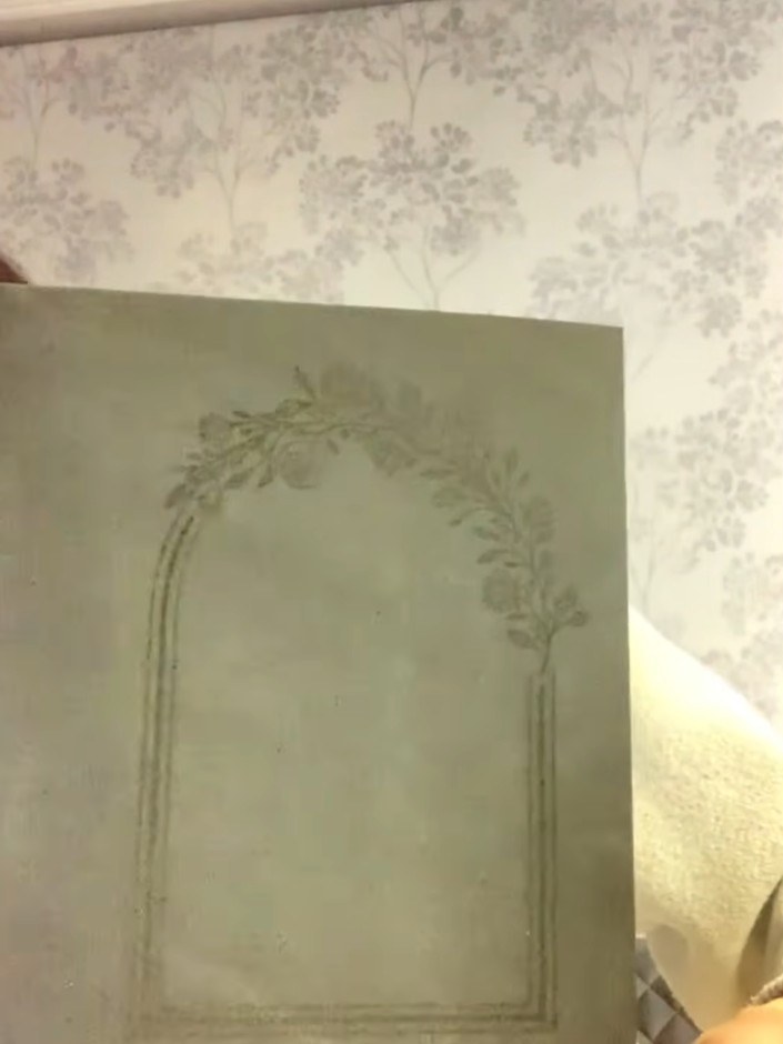 Step 4: Immediately pour your chosen WOW embossing powder over the stamped image to cover the entire floral arch desig