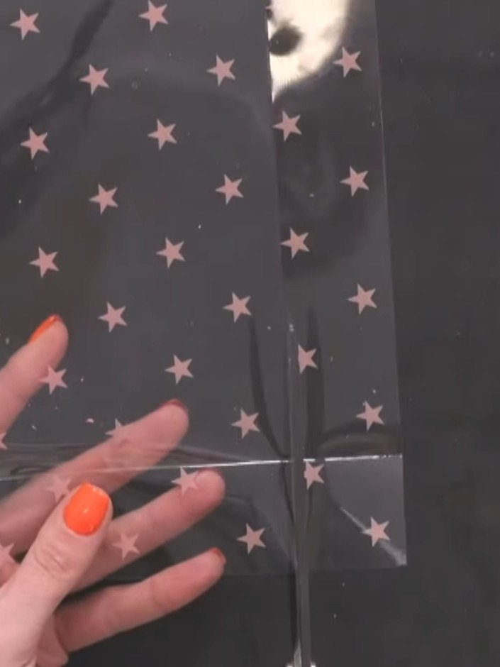 Step 5: At each corner, cut a diagonal line from the top corner down towards the base, then cut across to create a tap