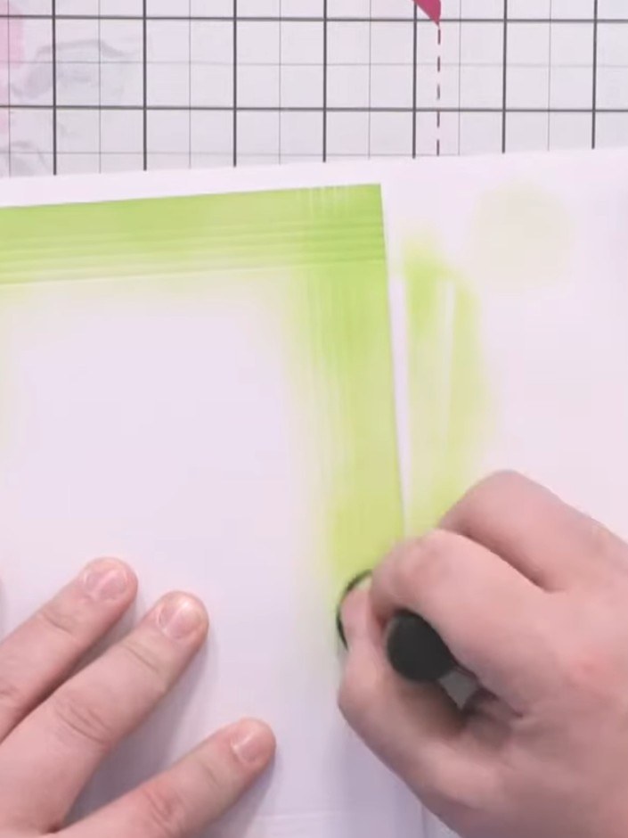 Step 5: Use the darker green ink pad to add depth to the corners and edges of the inked area. Blend the darker shade a