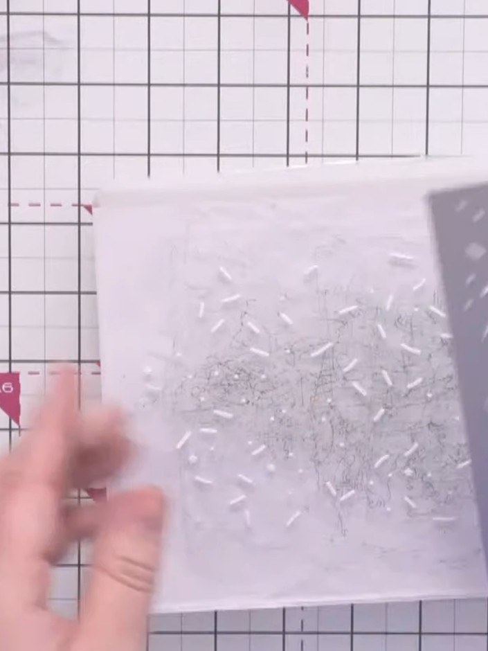 Step 1: Die-cut the sprinkle background from white card using the A5 Sweet Sprinkles die, which features stars, sprink