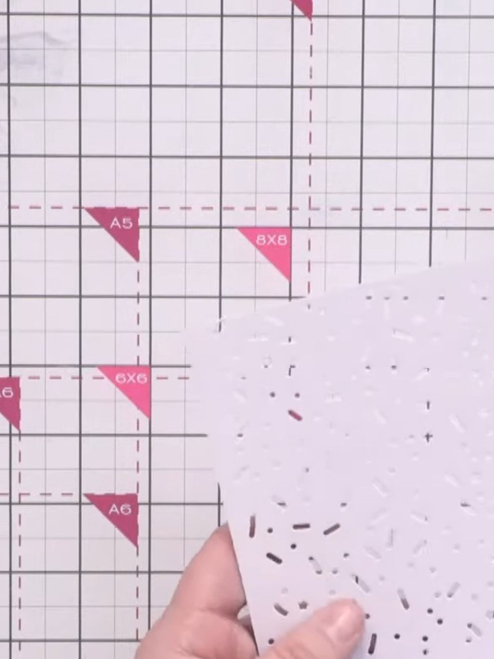 Step 2: Brush away the small die-cut pieces from the sprinkle background die. Use a poker tool to release any stubborn