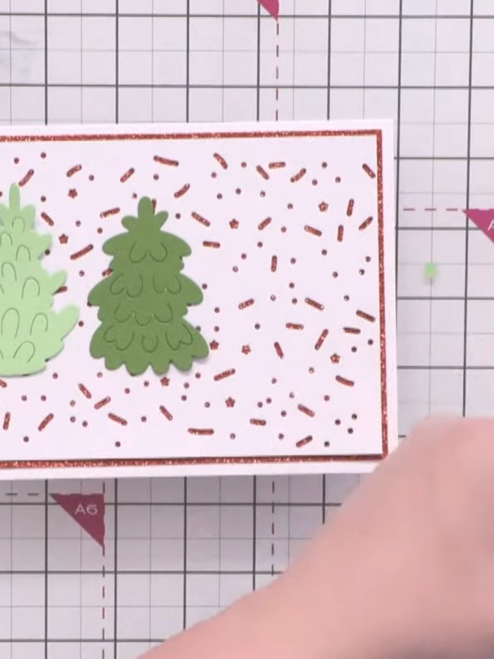 Step 7: Trim the lighter green trees to a similar height. Gently curl the trees to give them shape and dimension.