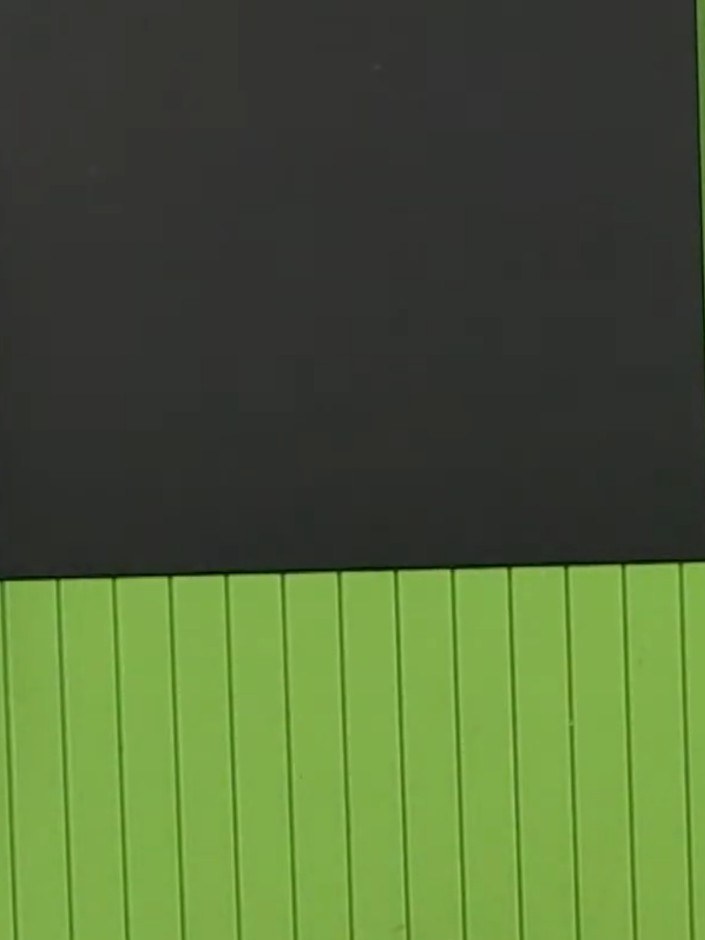 Step 3: Fold the black cardstock along the score line to create the pocket flap.