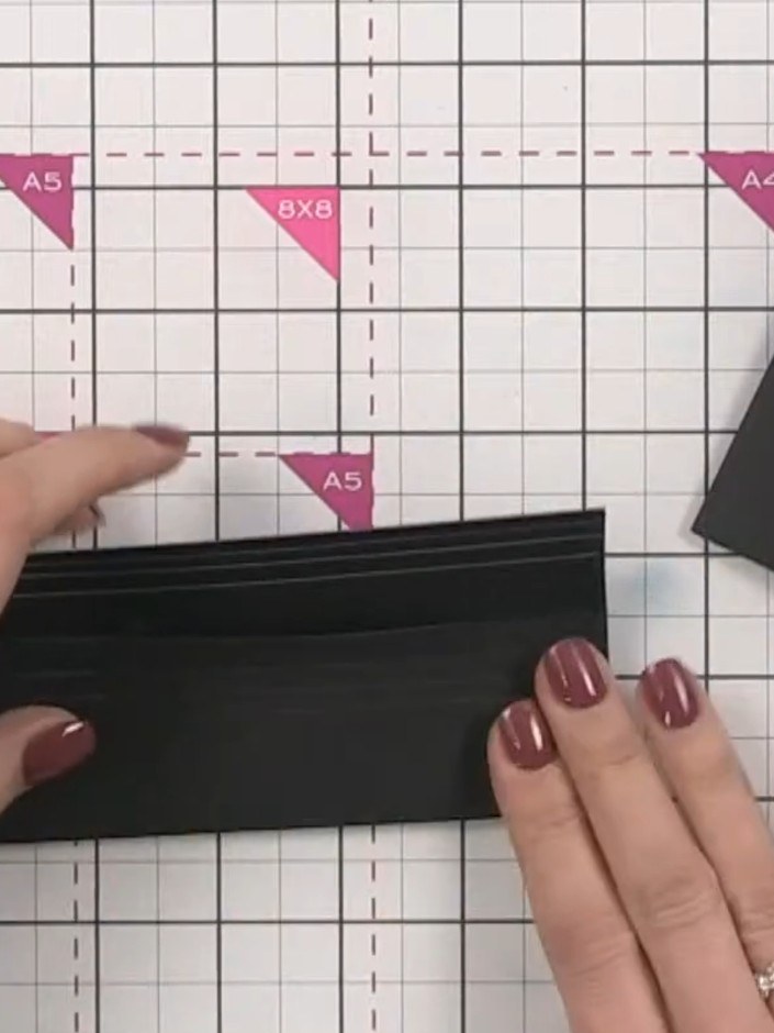 Step 5: Place the completed pocket page into your album. The pocket opens from the top, allowing you to tuck photos, j