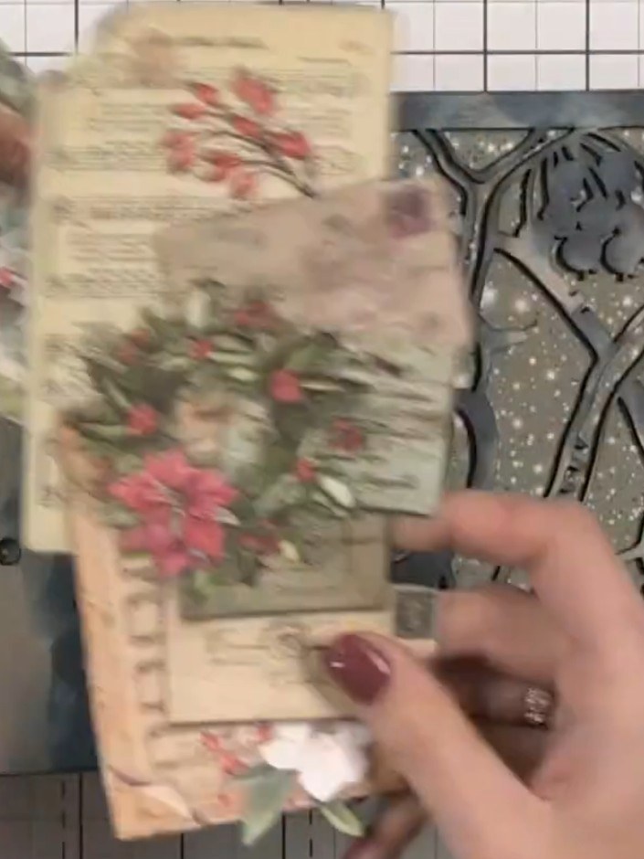 Step 6: Layer embellishments onto the front cover using 3D foam pads to create dimension. Position decorative elements