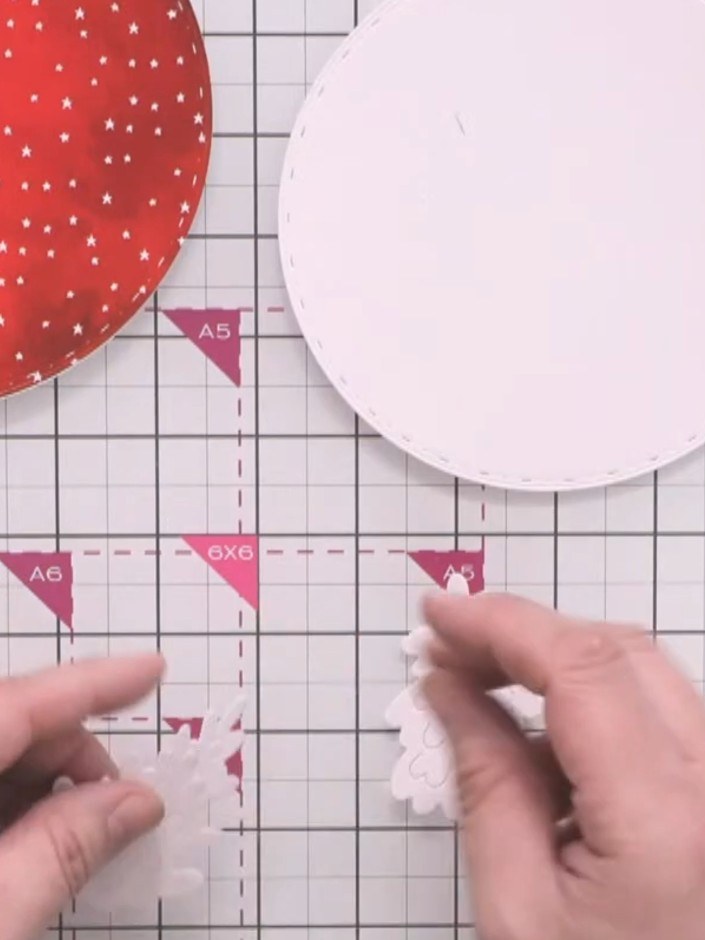 Step 11: Gently tease up the lift-up panels on the tree pieces to add dimension and texture to the trees.