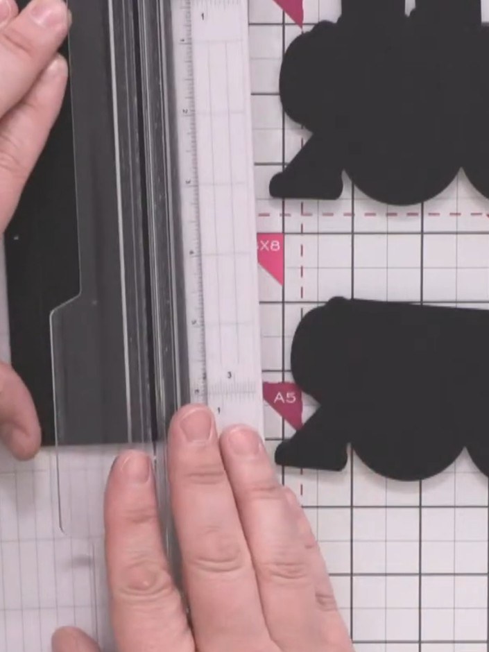 Step 4: Score the black card at half-inch intervals down the length. Then score at 1.5 inches across the width to crea