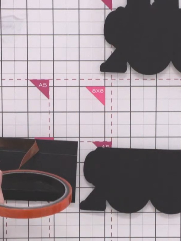 Step 7: Apply red liner tape to the two long edges of the black box structure piece.