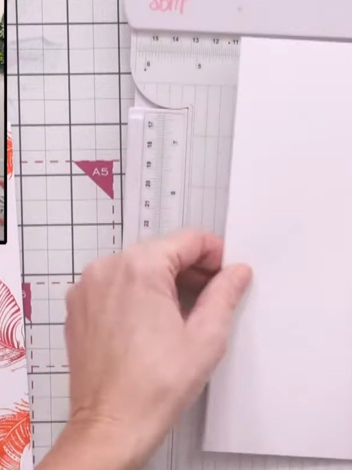 Step 4: Cut a piece of the watercolour rainbow paper and position it down the middle of the card as a background panel