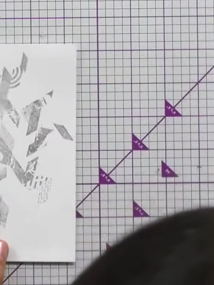 Step 2: Select coordinating papers from the Botanical Essence collection. Cut out three matching flower designs in dif